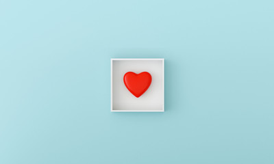 Red heart in the box on pastel light blue background. Valentine sweet concept.