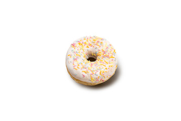 Donut with multi-colored decorative crumbs on a white isolated background. Bakery, baking concept