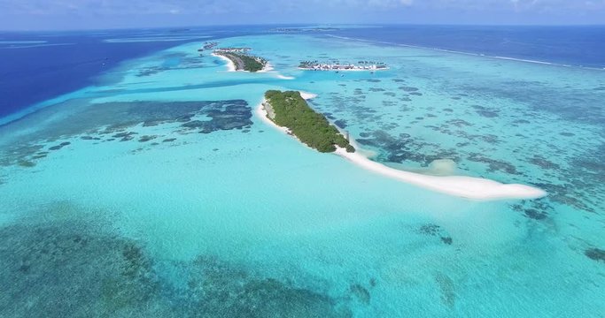  Landscape seascape aerial view over a Maldives Male Atoll island