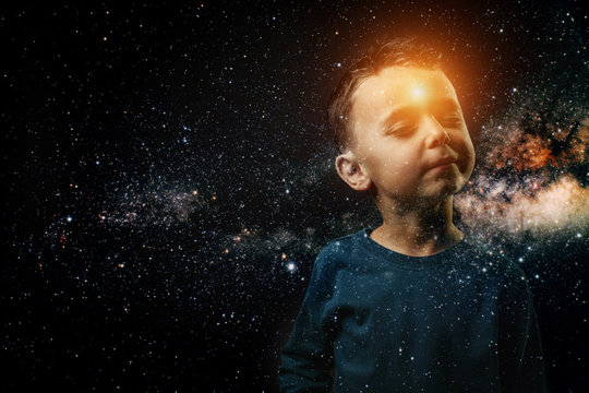 a small child whose light shines in his forehead. He imagines himself an astronaut
