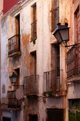 Fototapeta na wymiar balconies of old houses