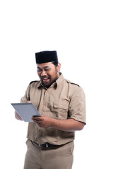 happy indonesian government worker using tabletp pc. businessman using modern device. pegawai negeri sipil