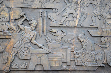 Relief wall in scene of Ganjiang and moye casting sword