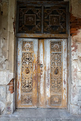Metal door leaf with figures of persons in the palace in the Szczepanow (Szczepanów) village, Sredzki (Średzki) poviat, Lower Silesia, Poland