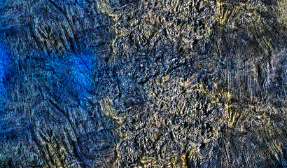 Textured stone wall in blue