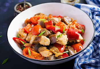 Chicken stir fry. Meat stew with vegetables sweet pepper, onion, tomato, eggplant  in soy sauce gravy. Ketogenic diet.