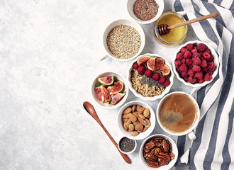 healthy breakfast oatmeal with raspberries, figs, chia and flax