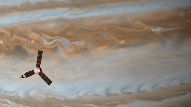 Satellite flying in the orbit of Jupiter. A spinning satellite flies against the background of the planet under bright sunlight. Satellite. Scientific Space 4K Video Footage