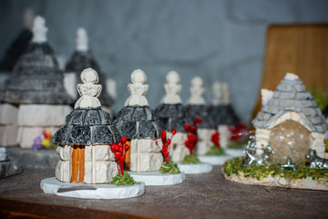 Colored souvenirs from Alberobello, South of Italy on Blurred background