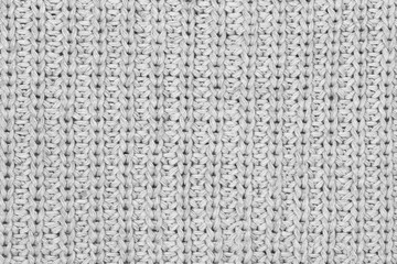 White natural texture of knitted wool textile material background. White cotton fabric woven canvas texture