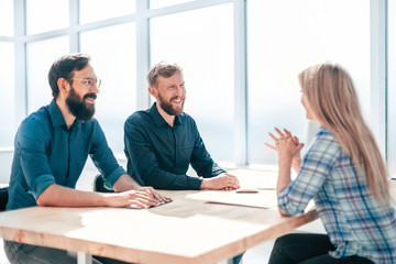 HR managers in an interview with a new employee.