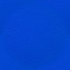 Seamless texture, background of a blue rough painted wall