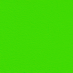 Seamless background of a green rough painted wall, texture