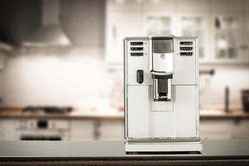 Coffee machine and blurred kitchen interior. 