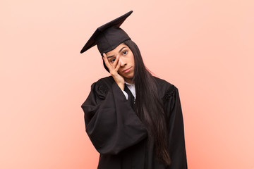 young latin woman student feeling bored, frustrated and sleepy after a tiresome, dull and tedious...