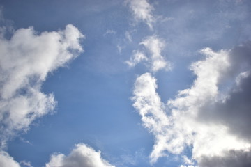 clouds against a blue sky