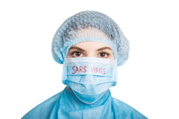 Portrait of sick woman wearing medical uniform and mask with SARS virus word isolated on white background. Coronavirus and health care concept