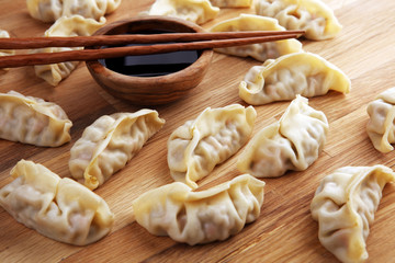 Gyoza or dumplings snack with soy sauce.