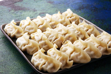 Gyoza or dumplings snack with soy sauce.