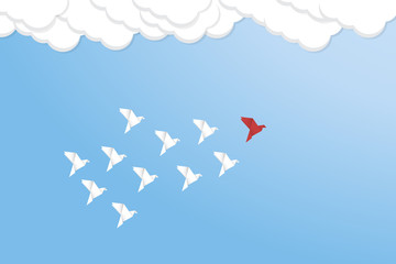 Red bird changing direction and white ones. New idea, change, trend, courage, creative solution, business, innovation and unique way concept