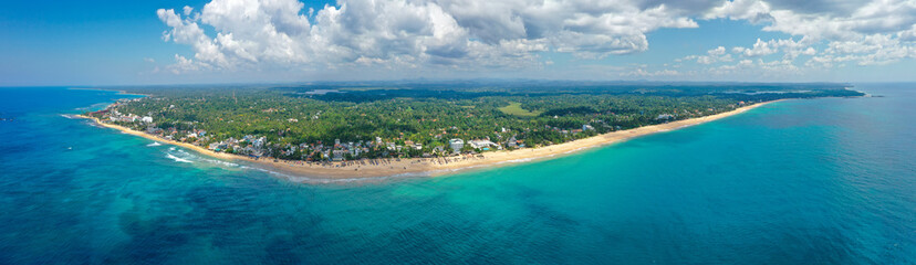 Fototapeta na wymiar Aerial view of the popular beaches of Hikkaduwa and Thiranagama, the best places for surfing and swimming. Island Sri Lanka