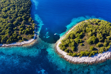 Aerial view on islands on sea. Azure water and islands with trees. Seascape from air at the summer time. Travel - image