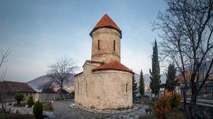 Fototapeta na wymiar 12th century Albanian Church of Saint Elishe or Holy Mother of God located in the village of Kish of the Sheki (Shaki) region of Azerbaijan