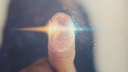 Businessman login with fingerprint scanning technology. fingerprint to identify personal, security...