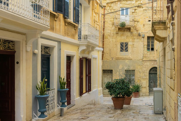View of ancient street in historical center of Birgu or Vittoriosa city in Malta
