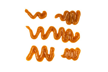 Orange sauce splashes isolated on white background