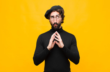 young french artist man scheming and conspiring, thinking devious tricks and cheats, cunning and...