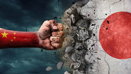 Fist breaking rock. China destroying Japan