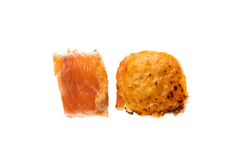 sushi and rolls with different toppings in two pieces close-up on a white background