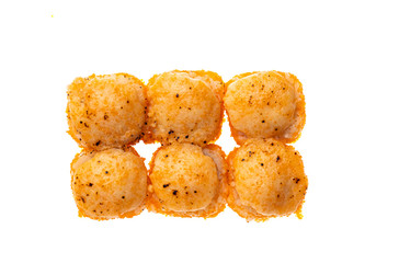 sushi and rolls with different toppings in eight pieces close-up on a white background top view