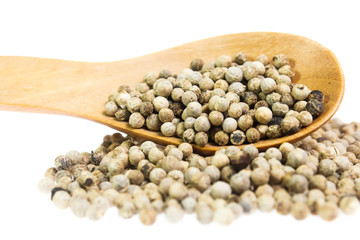 white peppers on the white background