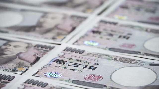 Close up japanese currency yen money banknote. Background concept for japan economy.