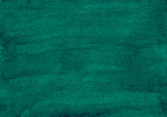 Watercolor dark emerald color background painting. Old deep blue-green watercolour texture. Vintage elegant backdrop.