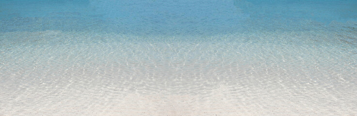 Transparent sea water on the beach.