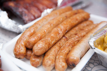 Close up of homemade sausages baked in an oven on Oktoberfest
