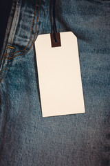 Blue jeans detail with blank tag