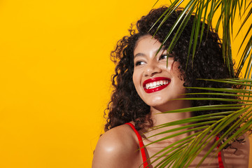 Woman in swimwear posing isolated