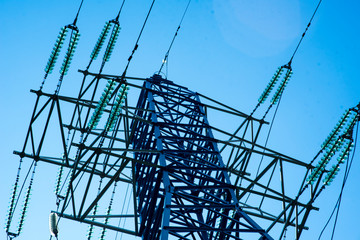 Telecommunication towers include of radio microwave and television antenna system with cloud blue...