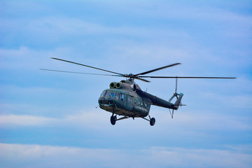 Fototapeta na wymiar Military helicopter flying