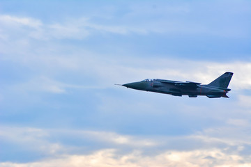 Fototapeta na wymiar Military airplane flying