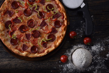 pizza with tomatoes and olives