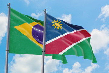 Namibia and Brazil flags waving in the wind against white cloudy blue sky together. Diplomacy concept, international relations.