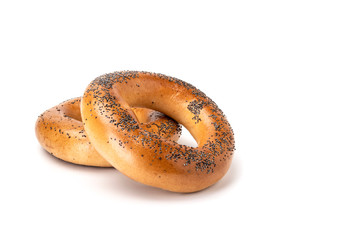 Bagels with poppy seeds on a white background