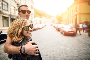 Loving young couple are walking around the city © Vadim Pastuh