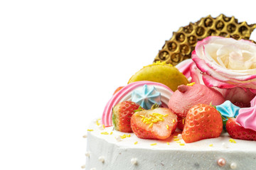 Cake of strawberries, chocolate, marshmallows, roses and sweet decorations close-up,