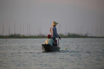 Foto op Canvas The famous fishermen of Inle Lake, Myanma, working at sunrise © nelasova